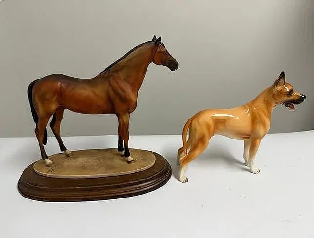 Porcelain horse figurine on wooden base and great dane dog figurine: Dimension: the horse base width 11 inch / 28 cm and the dog width 9.5 inch / 24.1cm , please note Due to manual measurement, dimensions may vary. Condition: Good used condition, please note buyers