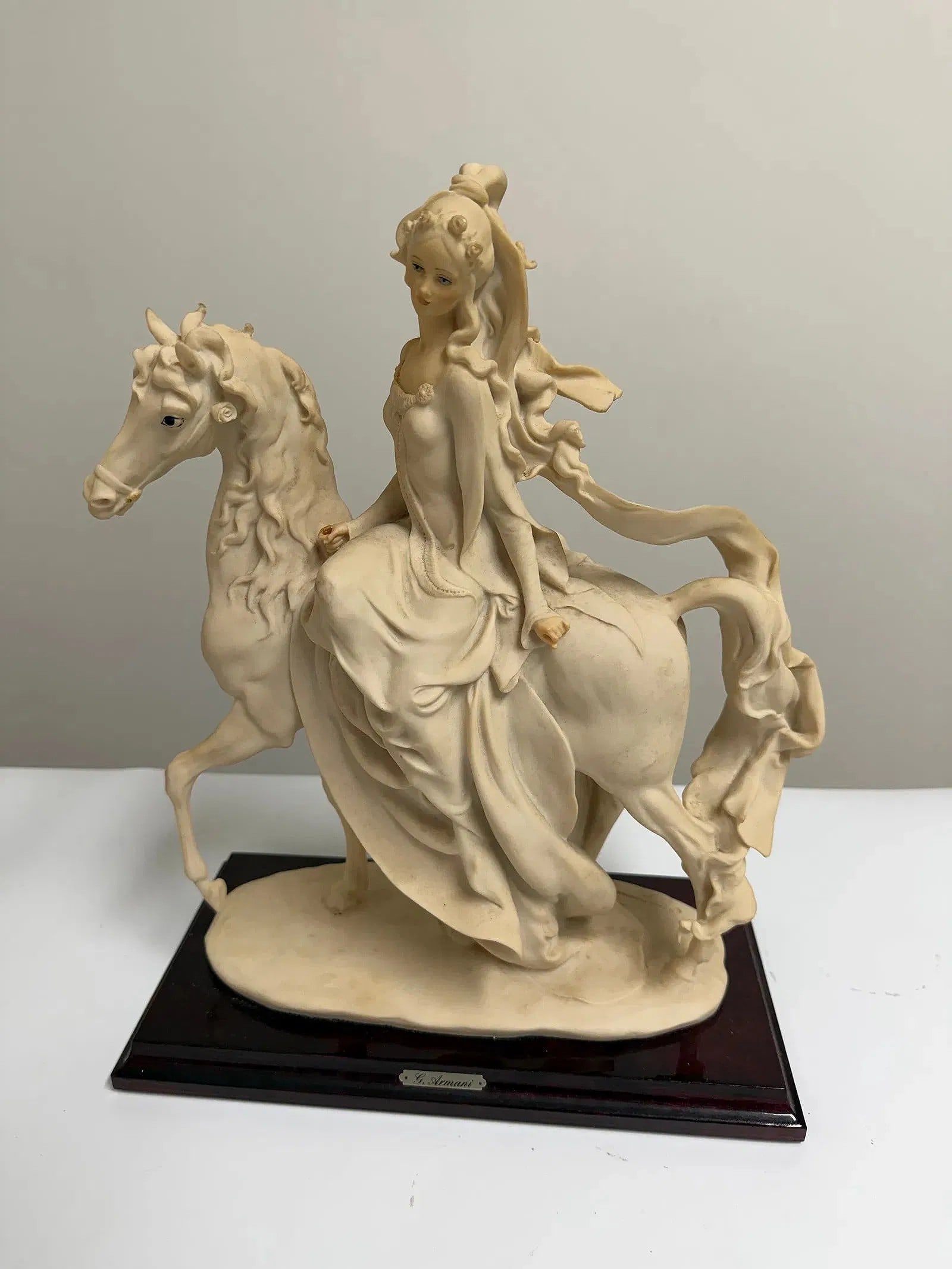 Vintage equestrian lady figurine on wooden base: Dimension: 12 cm , please note Due to manual measurement, dimensions may vary. Condition: Good used condition, please note buyers are obligated to come to the site to inspect the condition and details