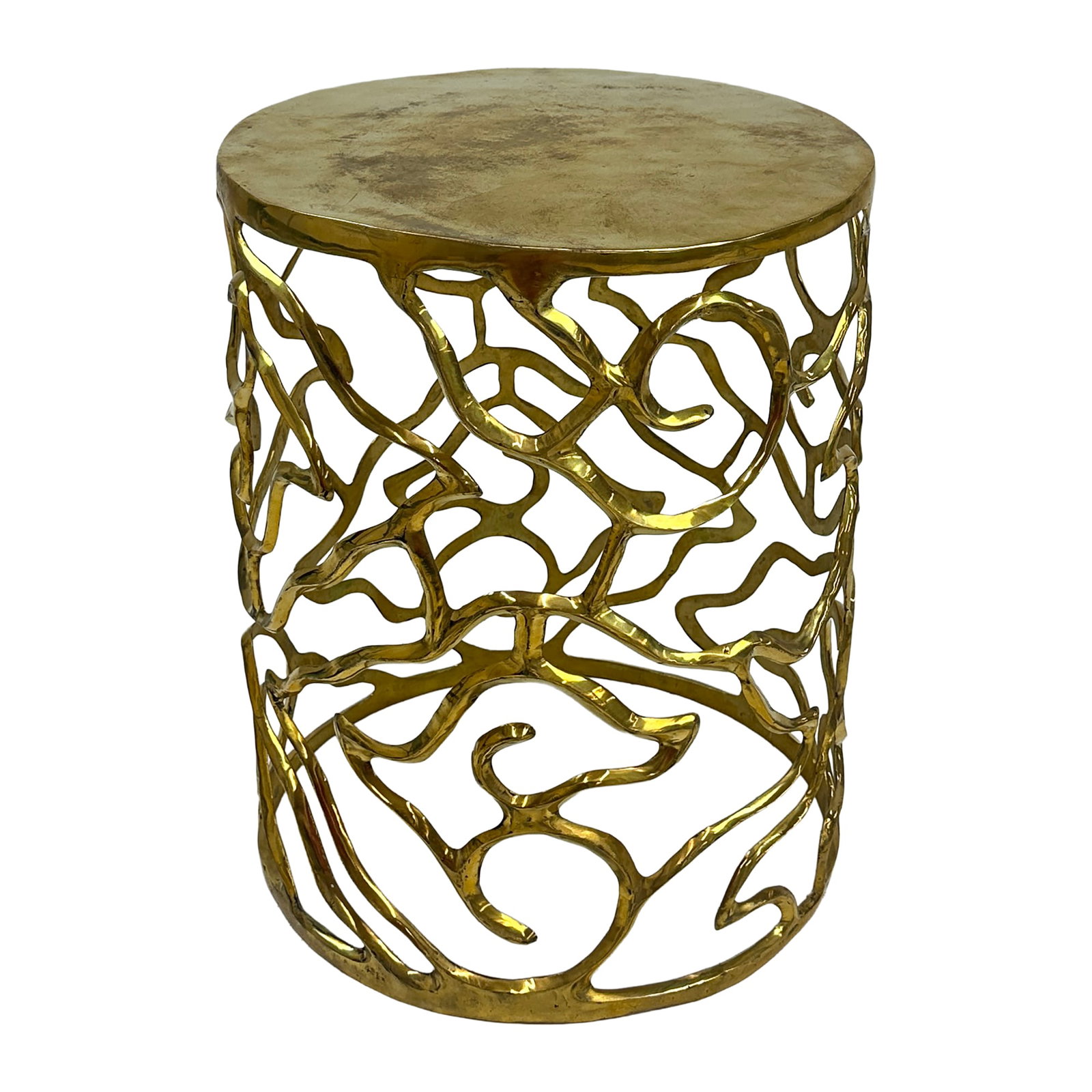 Bali Sculptural Brass Stool: The Bali Brass Stool stands 18 inches tall and radiates warmth with its handcrafted, golden glow. Its open, freeform brass design evokes the fluid beauty of nature, creating an airy yet artful