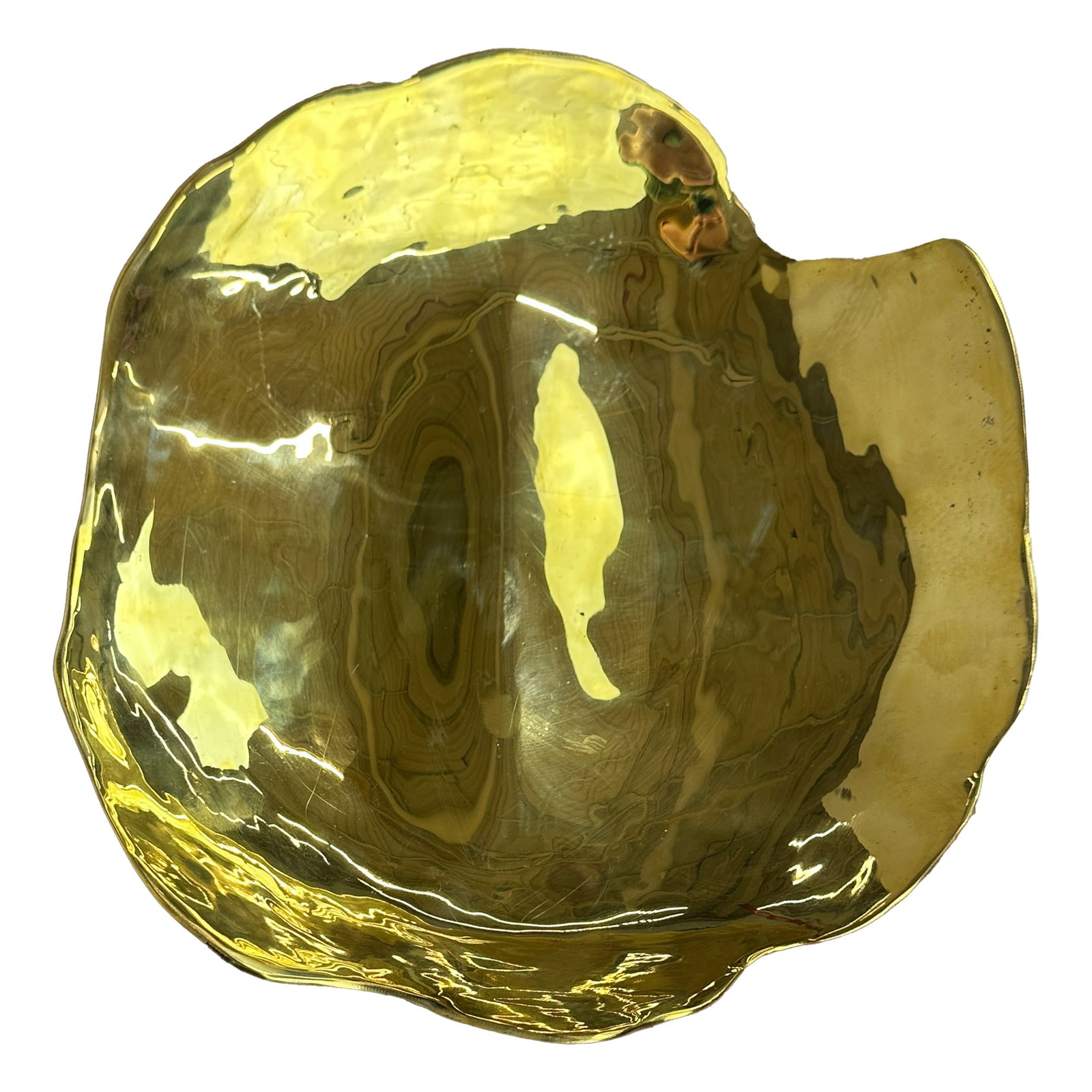 Organic Sculptural Brass Decorative Bowl: A sculptural brass bowl featuring an organic, freeform silhouette with rippled, uneven edges and a high-polish finish. This handcrafted piece showcases artisan character and natural imperfections,