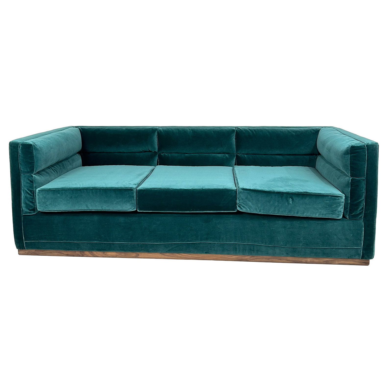 Berlin Emerald Green Velvet Modern Sofa: The Berlin Sofa features a sleek, low-profile design with a modern silhouette. Upholstered in a beautiful emerald green velvet, it offers plush comfort with firm cushioning and wide track arms for a