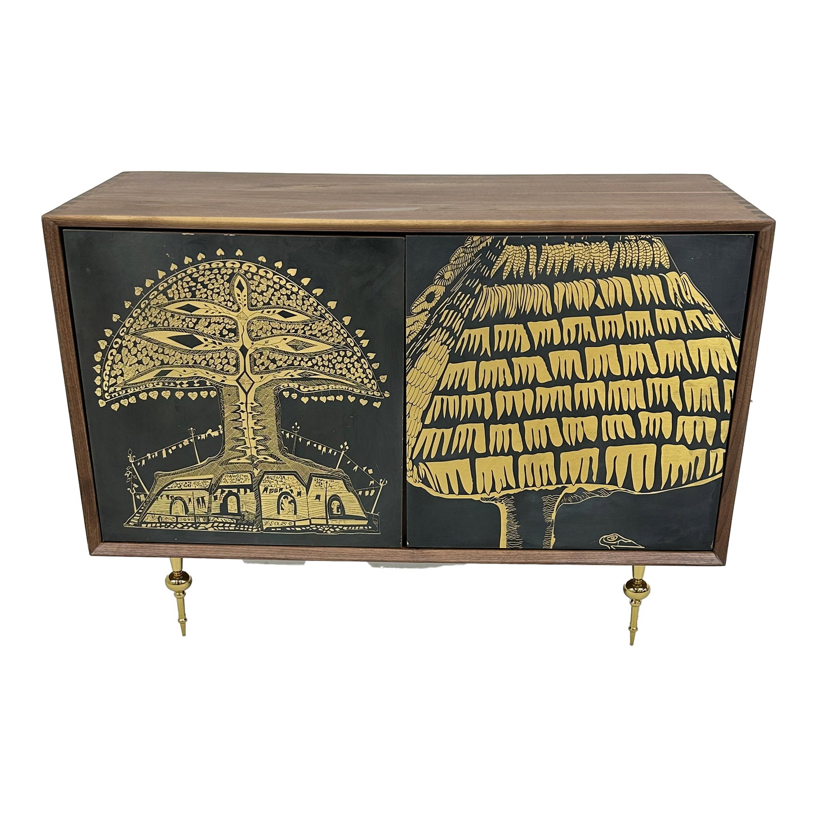Etch Wood Cabinet with Brass Landscape Doors: The Etch Cabinet is a striking art piece as much as it is a functional storage unit. Crafted from rich wood, it features intricately etched brass doors that depict detailed tree and landscape motifs