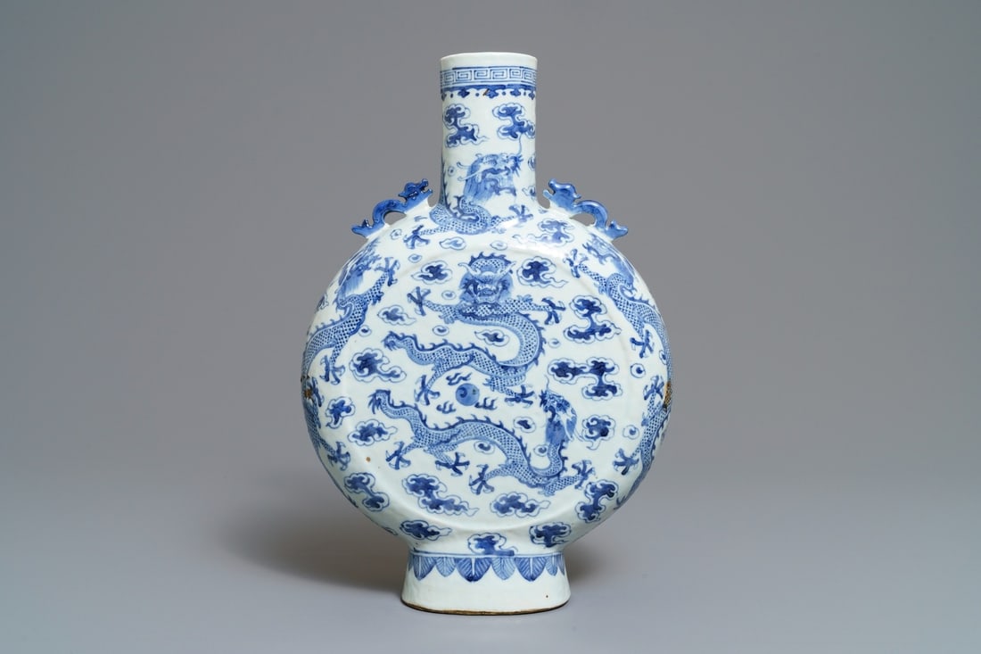 A Chinese blue and white 'dragon' moonflask, 19th C. (1 of 6)