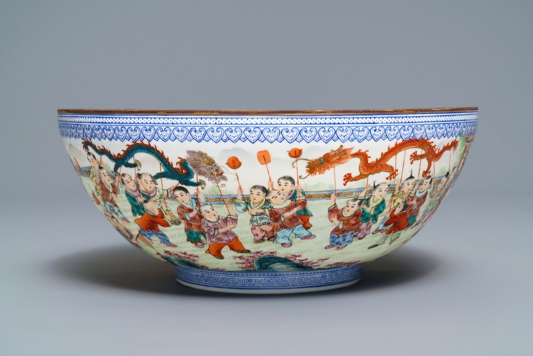 A Chinese famille rose '100 boys' eggshell bowl, Qianlong mark, 20th C. (1 of 7)