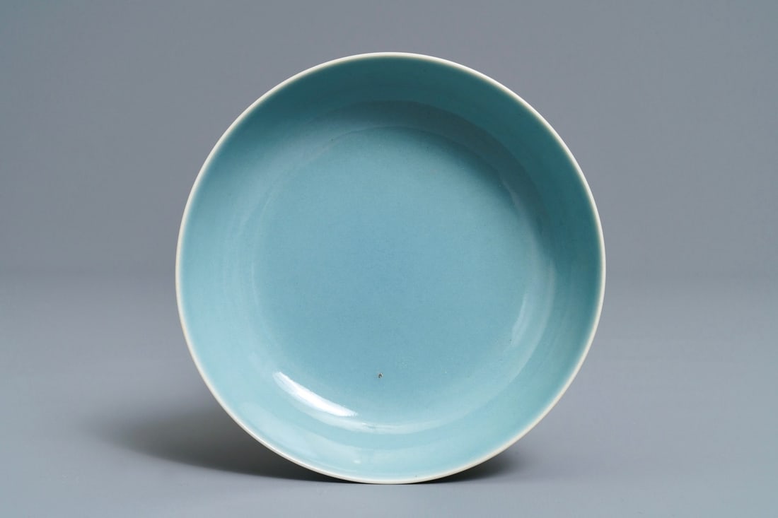 A Chinese monochrome clair-de-lune-glazed saucer dish, Qianlong mark, 19/20th C. (1 of 3)