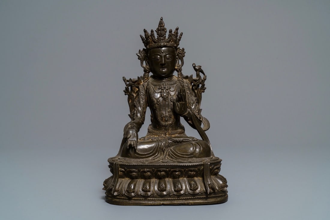A Chinese Ming-style bronze model of Buddha, Qianlong (1 of 3)