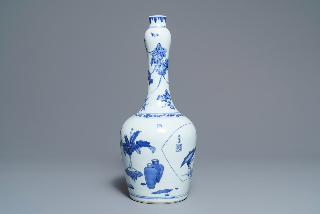 A Chinese blue and white bottle vase with inscription, Transitional period (1 of 6)
