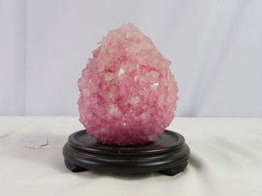 Pink crystal with wood base