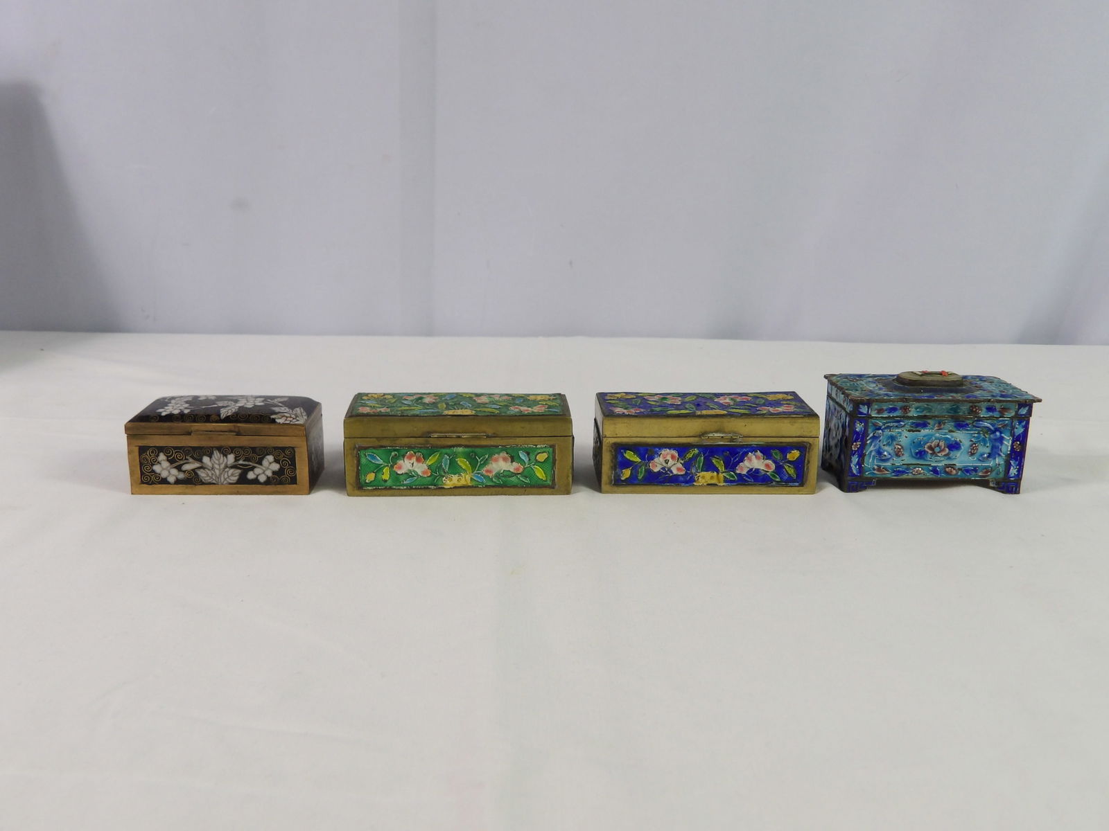 4 early pill boxes: 4 early pill boxes. All measurements approximate. Please see photos for condition and details. Selling as is from 04281.