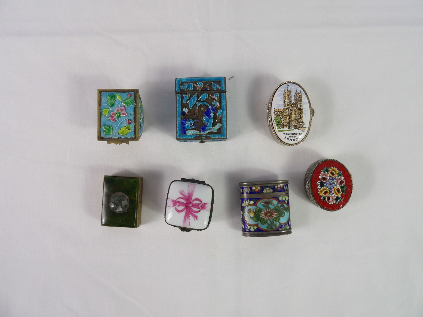 7 early pill boxes: 7 early pill boxes. All measurements approximate. Please see photos for condition and details. Selling as is from 04281.