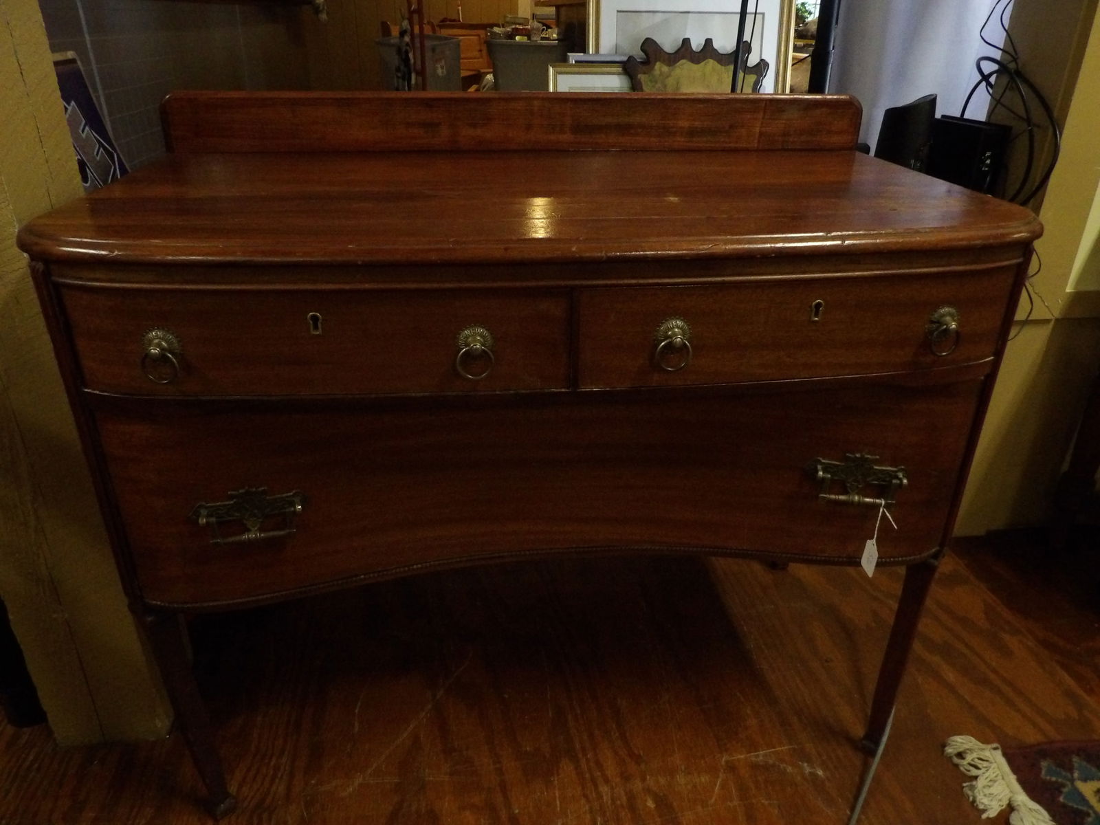 Sideboard: Sideboard. 20" by 39". All measurements approximate. Please see photos for condition and details. Selling as is from 04281.