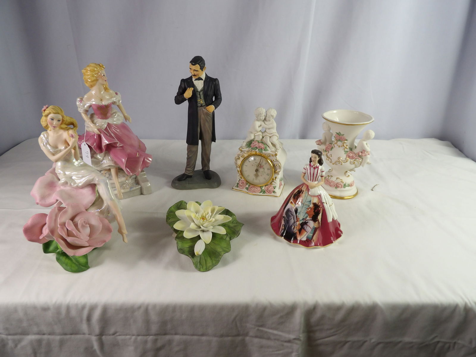 7 assorted figurines (1 of 3)