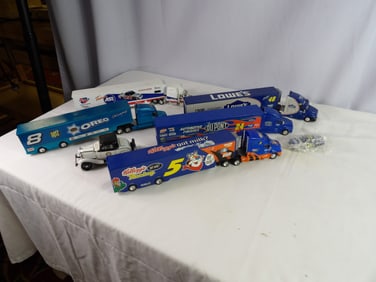 Lot of NASCAR tractor trailers