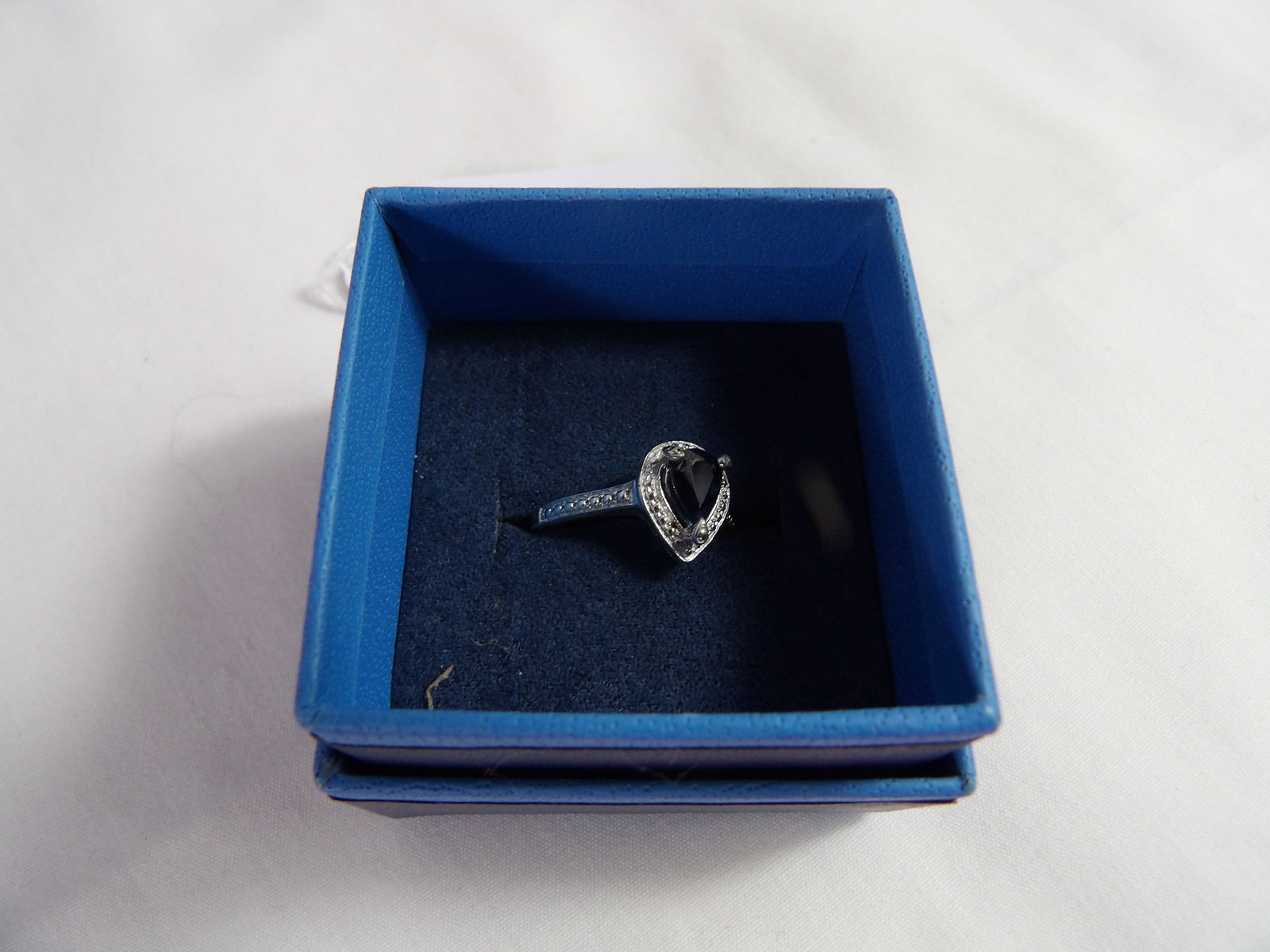 Midnight Blue Sapphire Ring: Midnight Blue Sapphire Ring, 1 ctw., Size 7, Sterling Silver. All measurements approximate. Please see photos for condition and details. Selling as is from 04281.