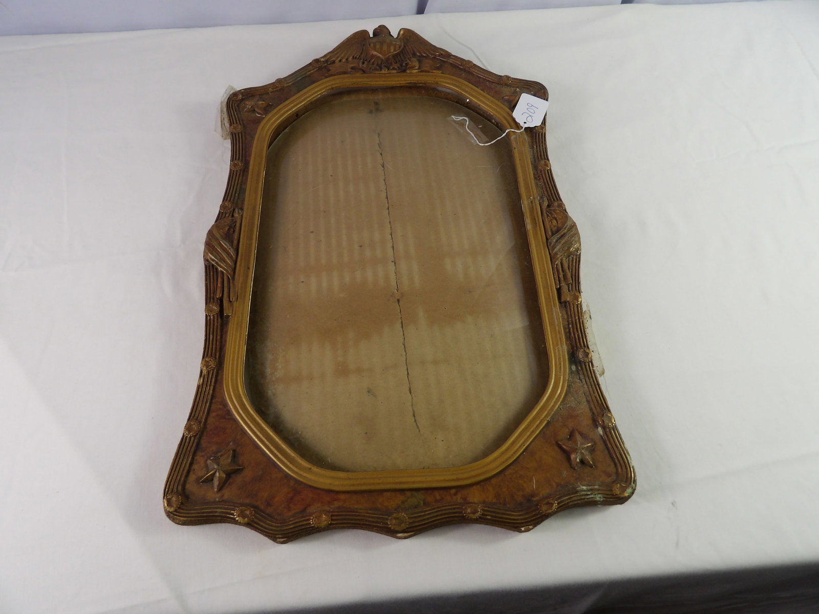 Guilded Bubble GlassFrame: 12" X 20" Guilded Bubble Glass Fram. USA. All measurements approximate. Please see photos for condition and details. Selling as is from 04281.