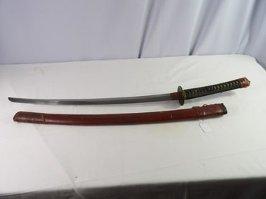 Sword with leather sheath