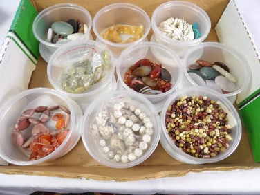 9 Tubs of Assorted Beads and Gems
