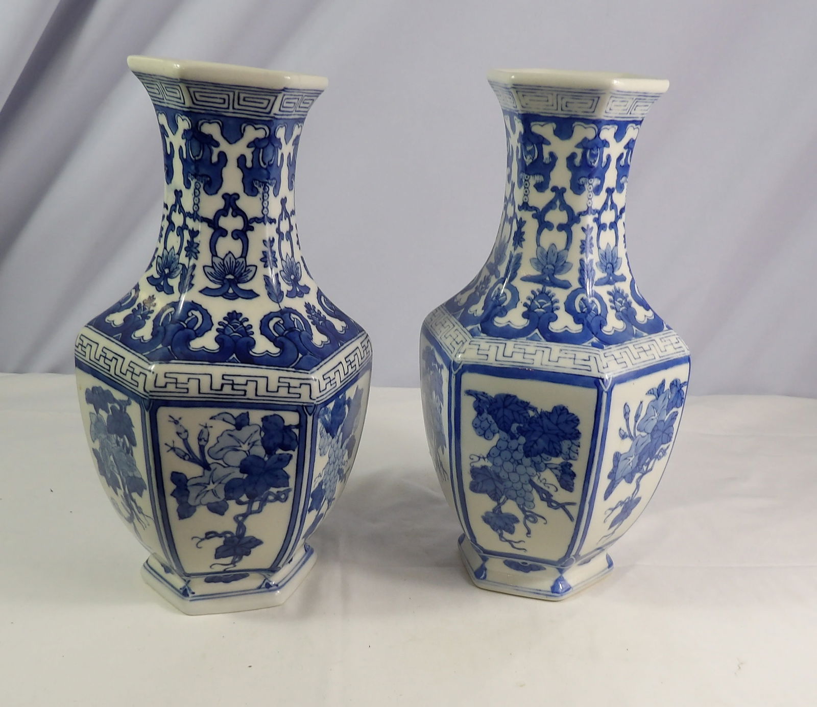 Pair of Tall Vases: Pair Of 14" Tall Vases. All measurements approximate. See photos for condition and details. Selling as is from 04281.