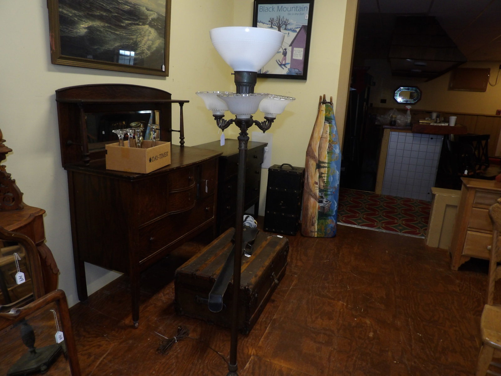 4-Light Floor Lamp: 63" Tall, 4-Lights, Brass Base, Floor Lamp. All measurements approximate. See photos for condition and details. Selling as is from 04281.