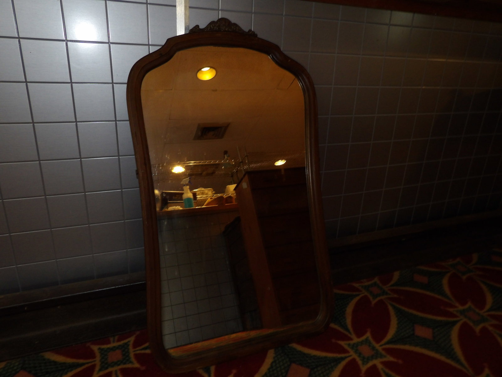 Early Hardwood Framed Mirror: 21" x 36" Early Hardwood Framed Mirror. All measurements approximate. See photos for condition and details. Selling as is from 04281.