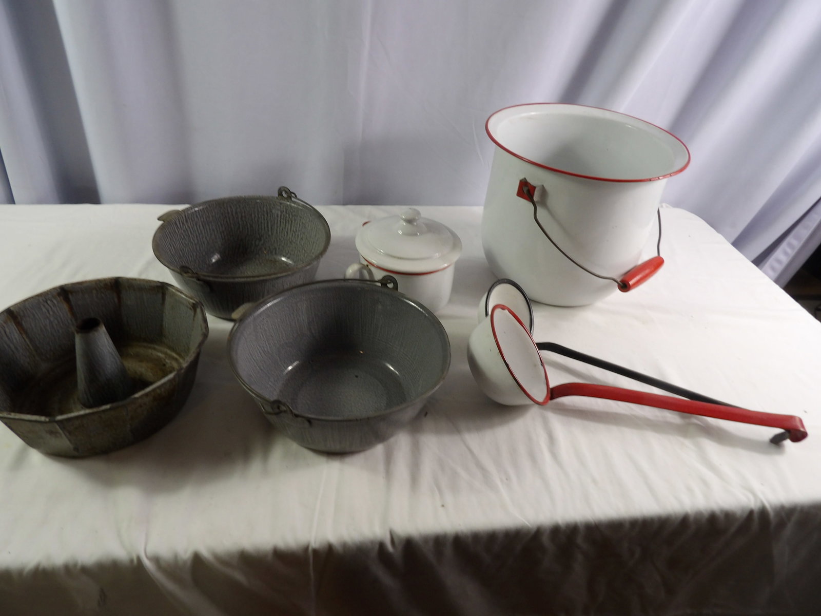 7 Pcs.- Vintage Enamel Pans: 7 Pcs. Vintage Enamel Pans. All measurements approximate. See photos for condition and details. Selling as is from 04281.