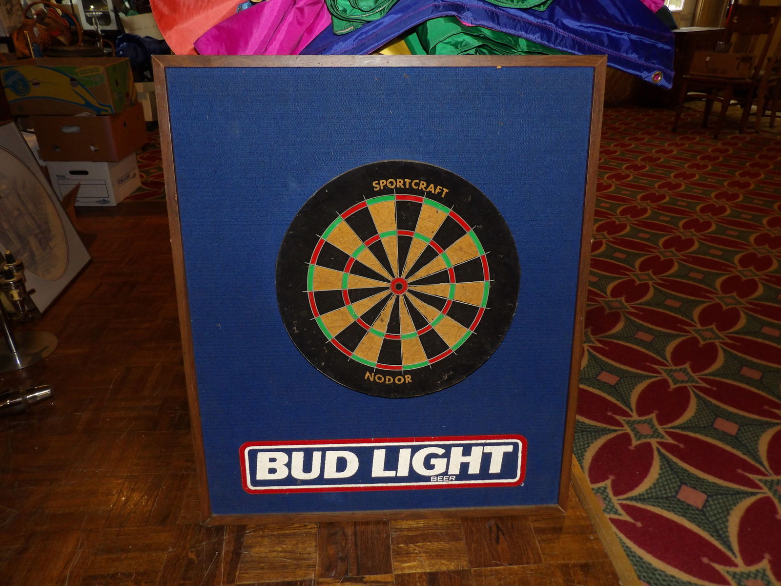 Bud Light Dart Board: 31" x 37" Bud Light Dart Board. All measurements approximate. See photos for condition and details. Selling as is from 04281.