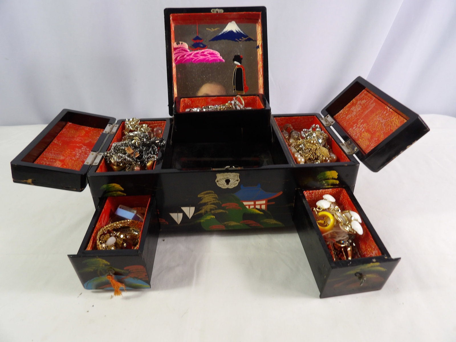 Large Lot of Costume Jewelry: Large Lot of Costume Jewelry with Box. All measurements approximate. See photos for condition and details. Selling as is from 04281.
