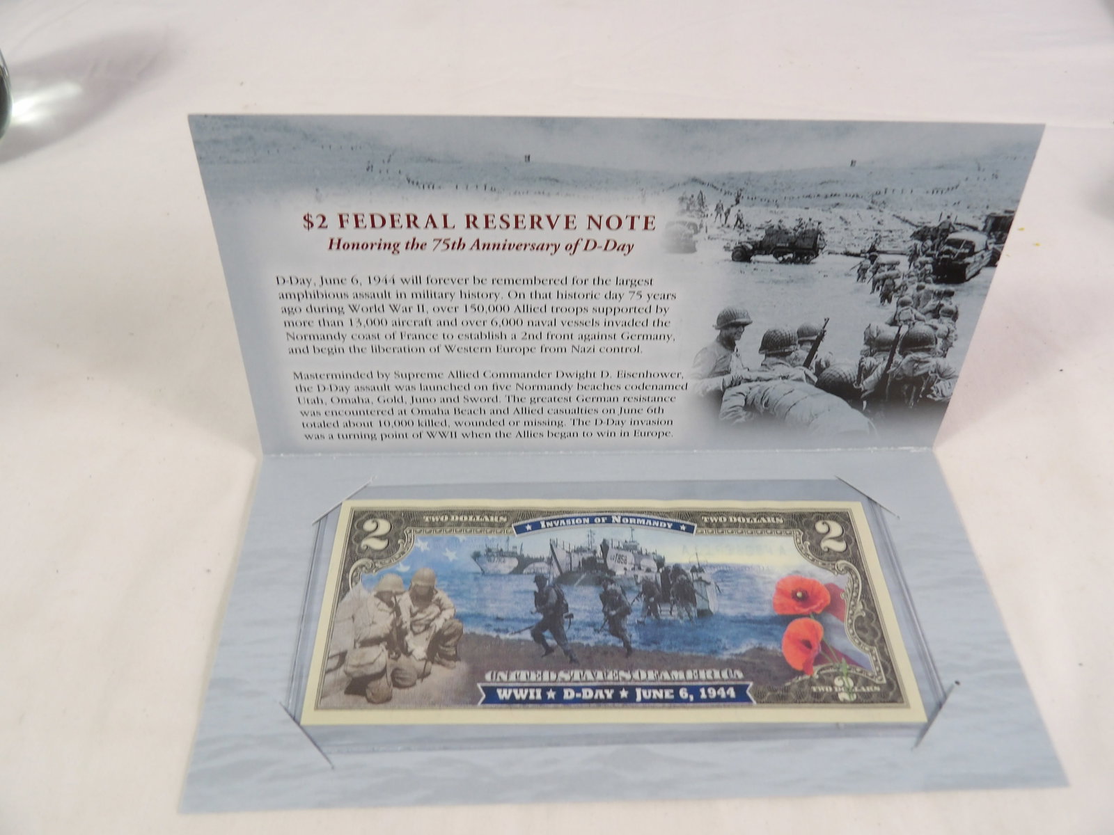 $2 Federal Reserve Note: $2 Federal Reserve Note Honoring the 75th Anniversary of D-Day. All Measurements approximate. See photos for condition and details. Selling as is from 04281.