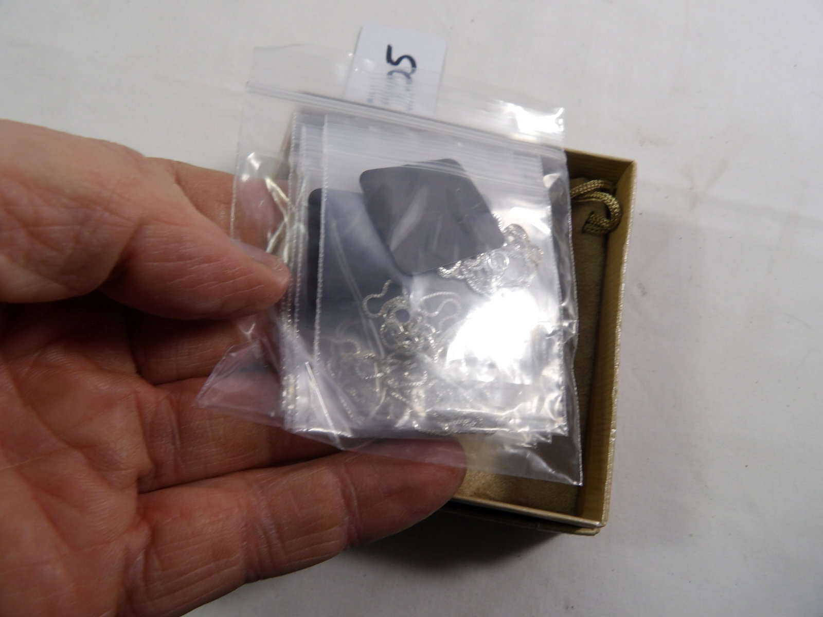 5 pcs- Sterling Silver Chains: 5 pcs. 18" Sterling Silver Chains, .5mm. All Measurements approximate. See photos for condition and details. Selling as is from 04281.