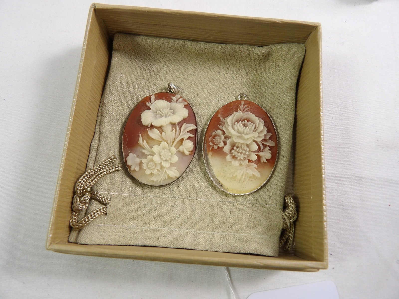 Pair of Sterling Silver Cameos: Pair of 1 3/4" Sterling Silver Cameos. All Measurements approximate. See photos for condition and details. Selling as is from 04281.