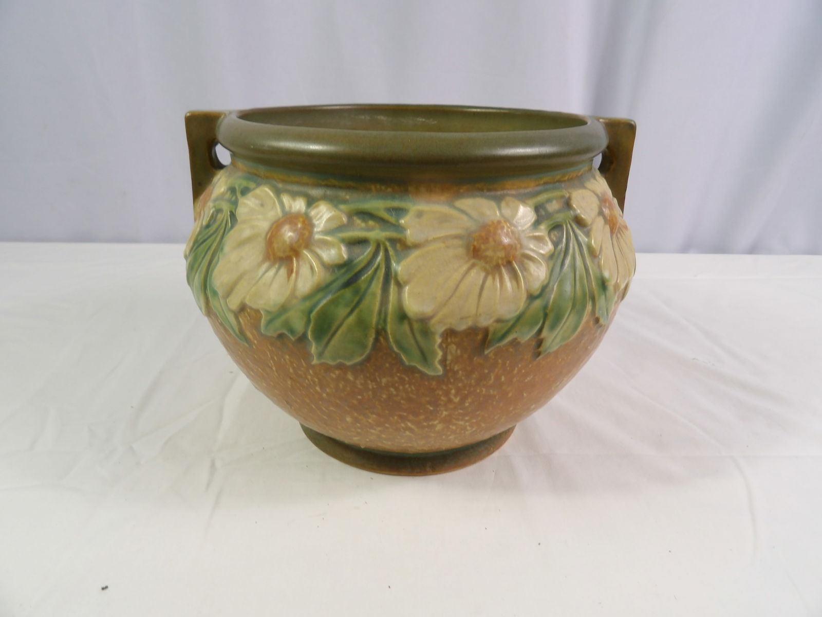 Unmarked Roseville Vase: 10" Diameter x 7" Tall Unmarked Roseville Vase. All measurements approximate. Please see photos for condition and details. Selling as is from 04281.