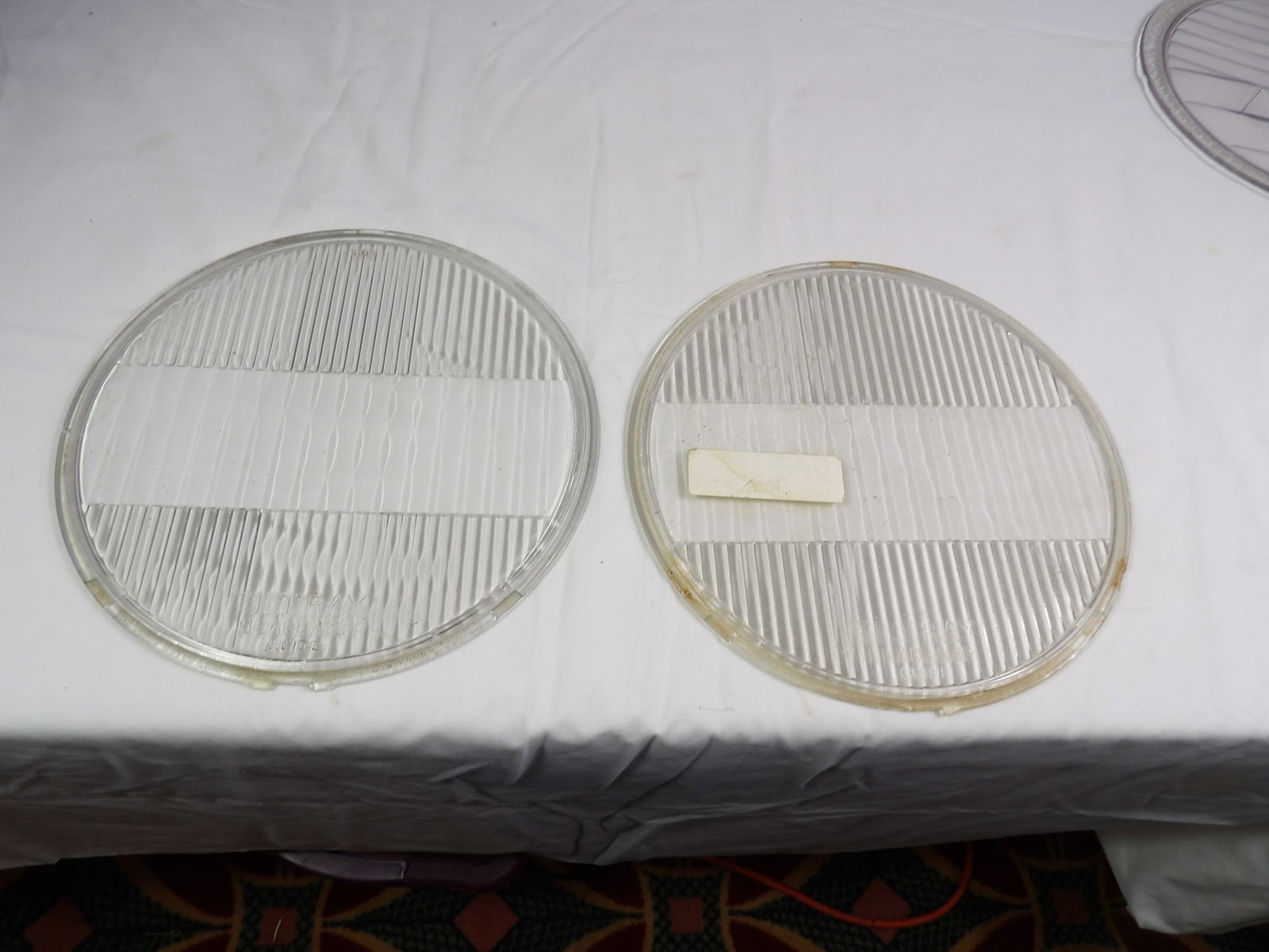 Pair Tilt-Ray Car Headlamp Lenses: Pair Tilt-Ray Car Headlamp Lenses GL 191. All measurements approximate. Please see photos for condition and details. Selling as is from 04281.