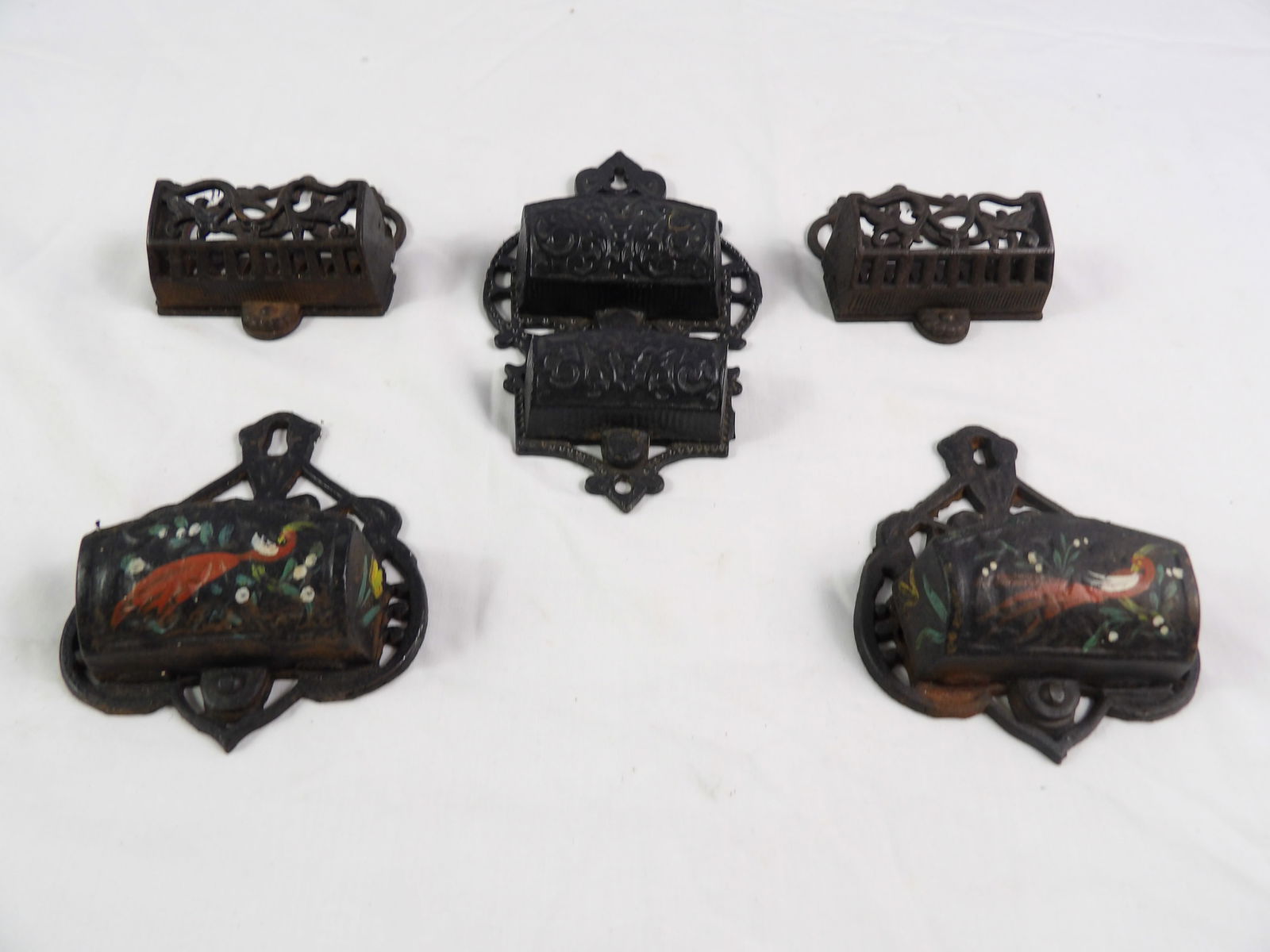 5 Pcs-Early Cast Iron Match Safes: 5 Pieces Early Cast Iron Match Safes. All measurements approximate. Please see photos for condition and details. Selling as is from 04281.