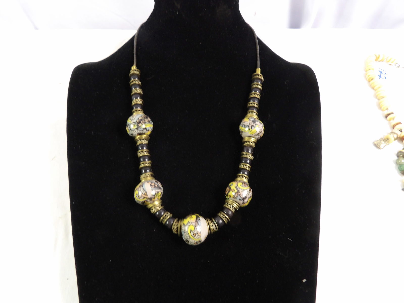 Bead Necklace: 24" Beaded Necklace. All measurements approximate. Please see photos for condition and details. Selling as is from 04281.