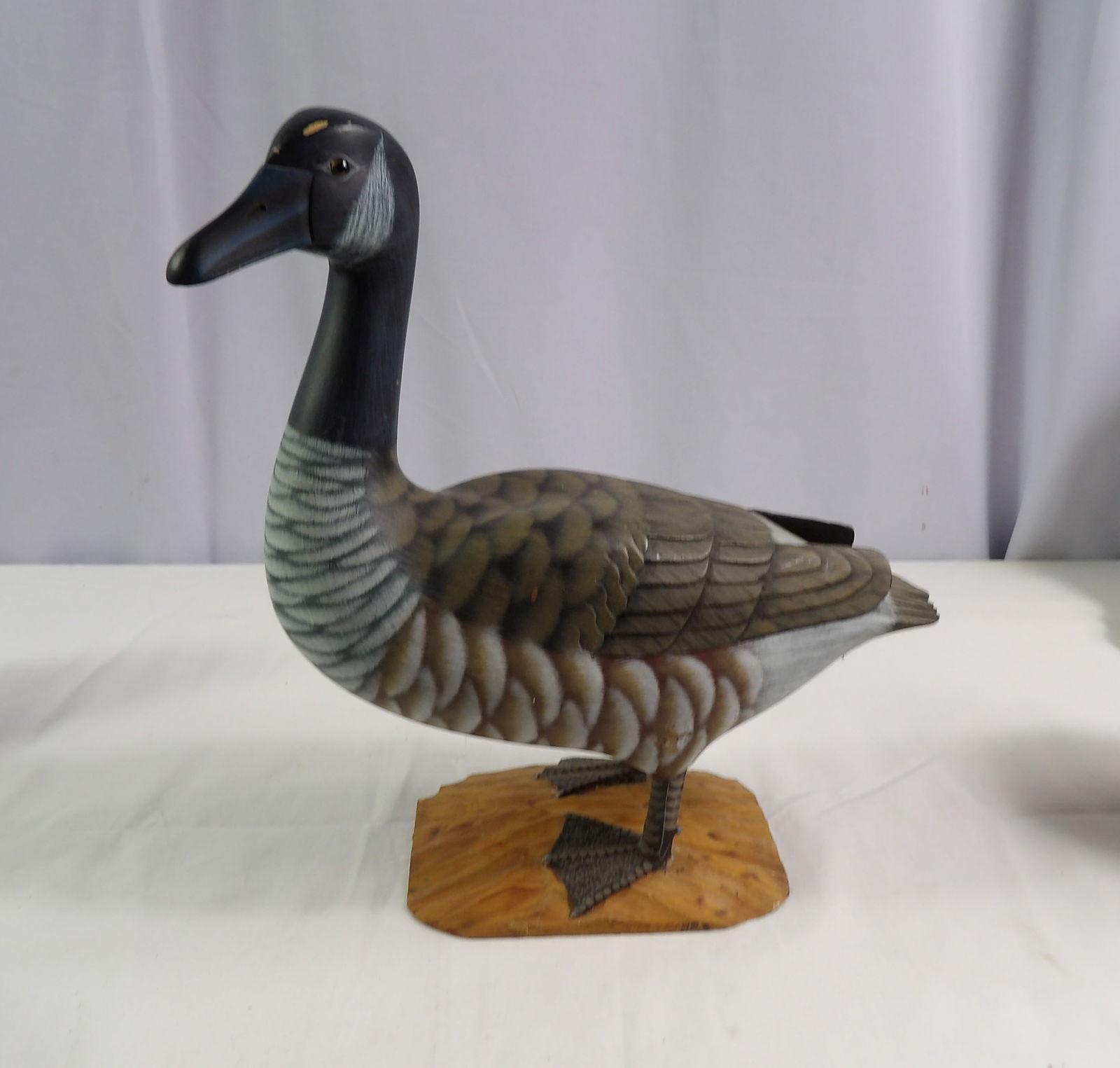 Wooden Carved Duck: 11" Wooden Carved Duck. All measurements approximate. Please see photos for condition and details. Selling as is from 04281.