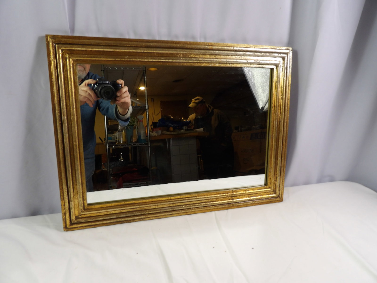 Framed Mirror: Framed Mirror. 16" x 21". All measurements approximate. Please see photos for condition and details. Selling as is from 04281.
