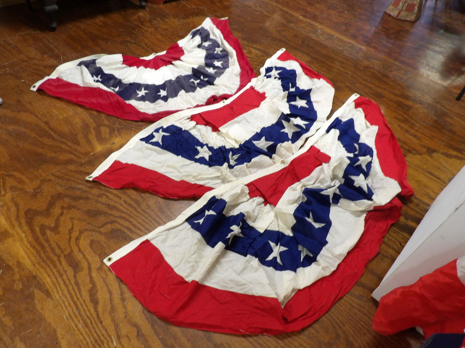 3 Pcs.- Cotton American Bunting Set: 3 Pieces 6' American Bunting Set. Cotton. All measurements approximate. Please see photos for condition and details. Selling as is from 04281.