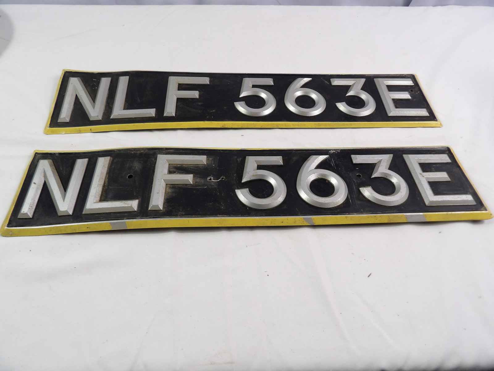 Pair of European License Plates: Matching Pair of European License Plates. All measurements approximate. Please see photos for condition and details. Selling as is from 04281.