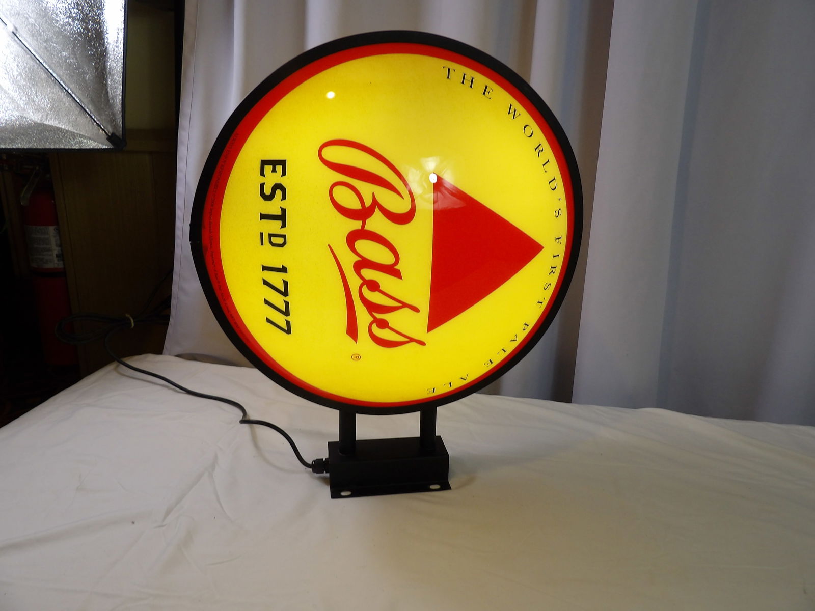2 Sided Bass Ale Sign: 2 Sided Bass Ale Sign. 18"Diameter. All measurements approximate. Please see photos for condition and details. Selling as is from 04281.