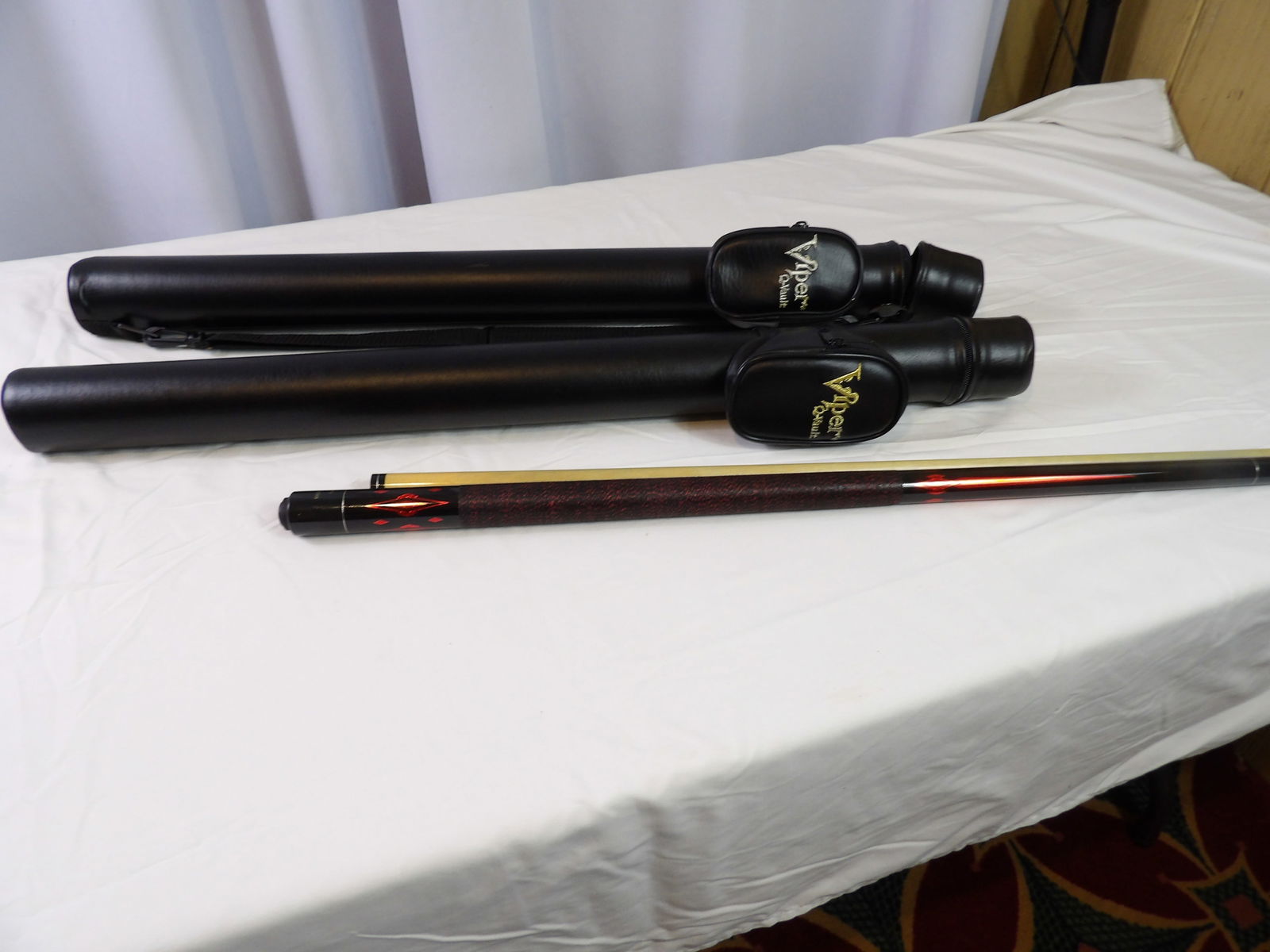 Pair of Viper Pool Cues: Pair of Viper Pro Series Pool Cues with Hard Carry Cases. All measurements approximate. Please see photos for condition and details. Selling as is from 04281.