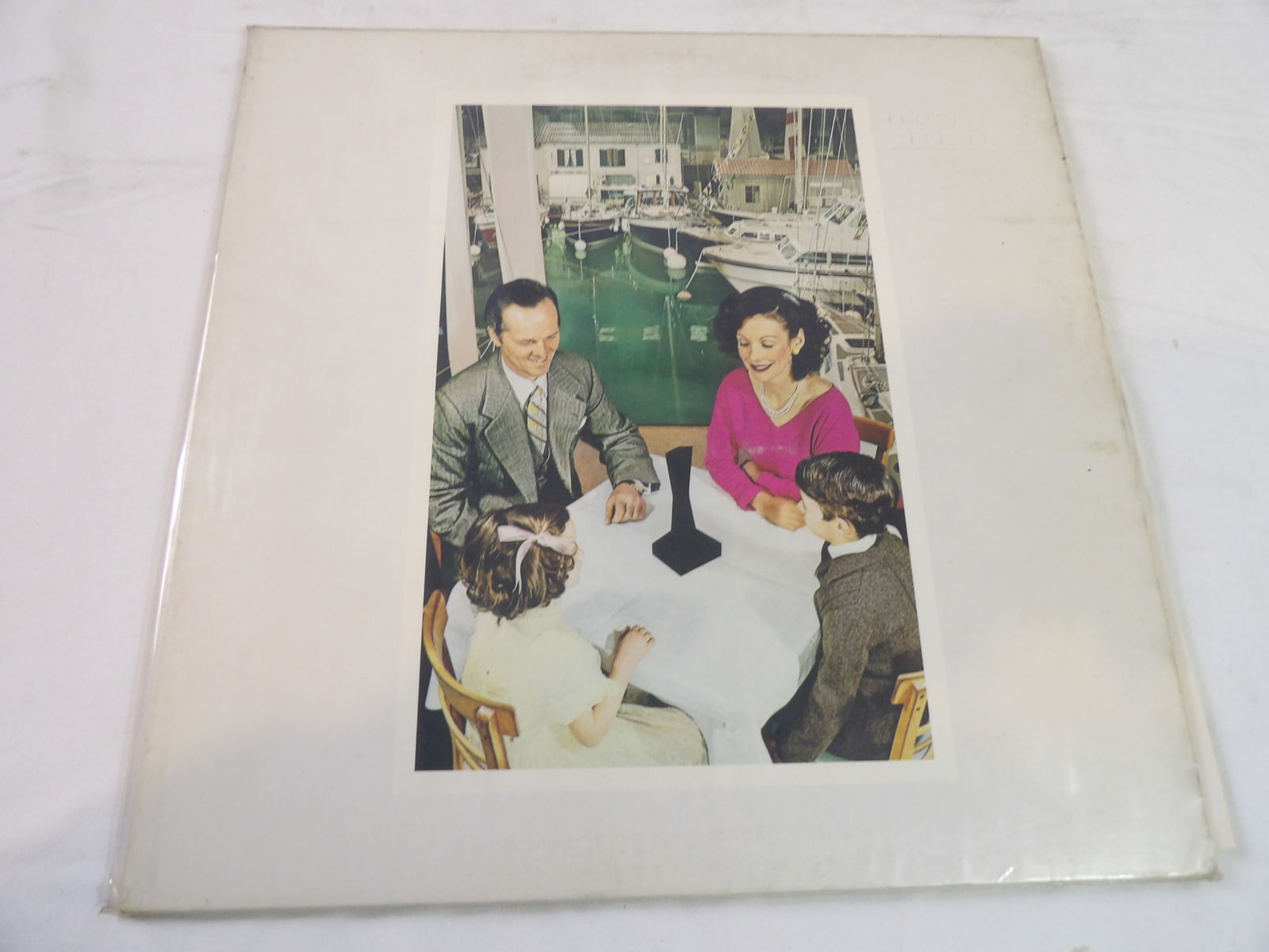 Led Zeppelin "Presence" LP: Led Zeppelin "Presence" LP. VG. All measurements approximate. Please see photos for condition and details. Selling as is from 04281.