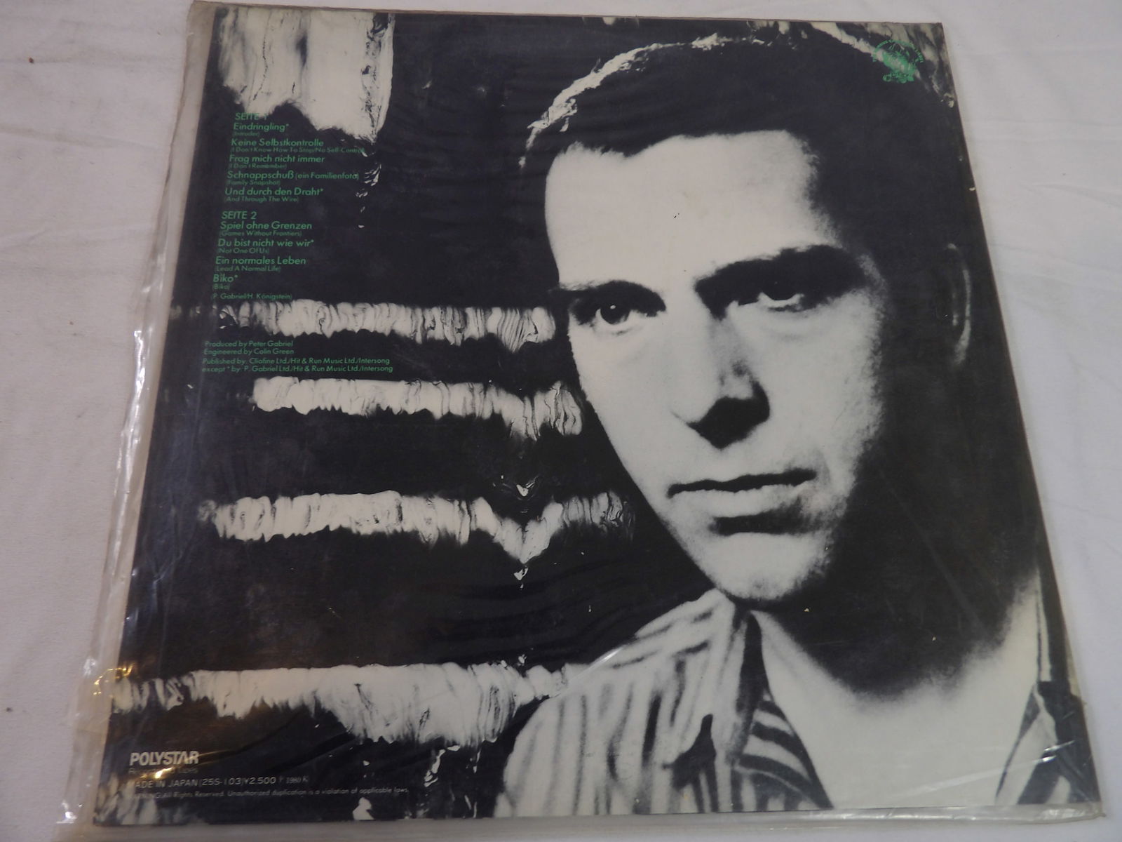 Peter Gabriel "Ein Deutsches" Album: Peter Gabriel "Ein Deutsches" Album. VG+. All measurements approximate. Please see photos for condition and details. Selling as is from 04281.