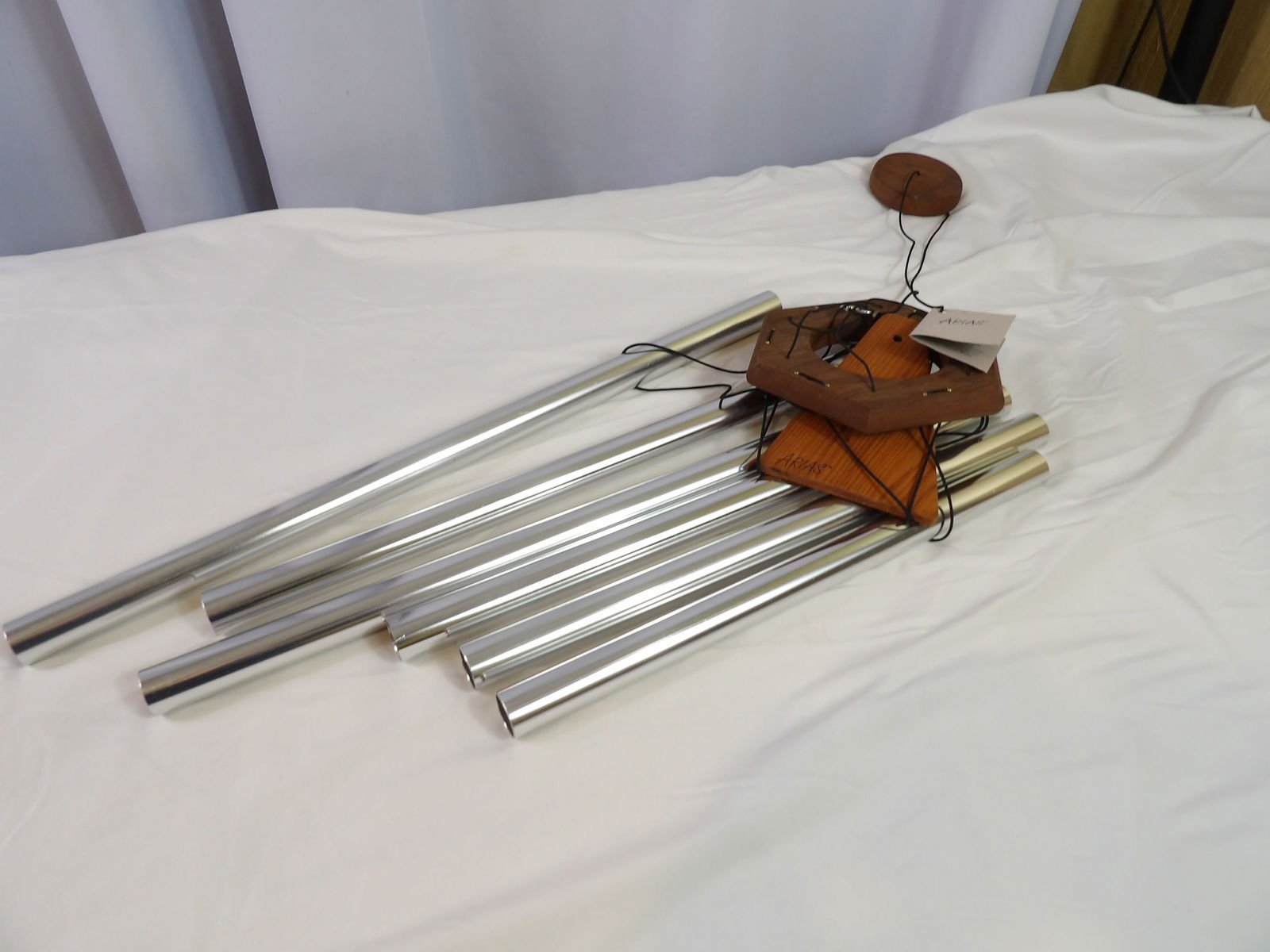 Wind Chimes: Arias Virginia Hand Crafted Wind Chime. All measurements approximate. Please see photos for condition and details. Selling as is from 04281.