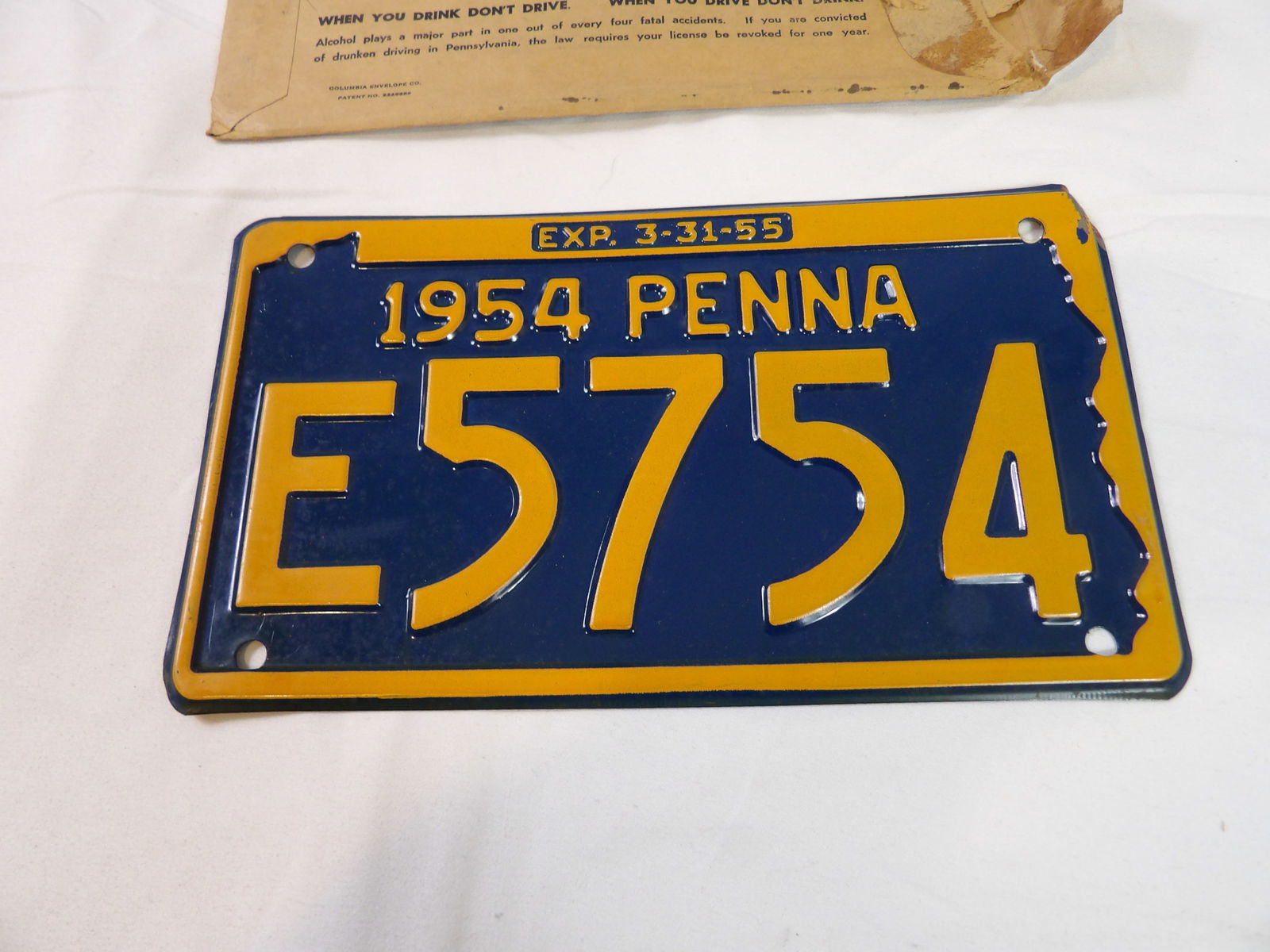 1954 Pennsylvania License Plate: 1954 Pennsylvania License Plate. New, Never Used. (Has a tiny dent on one corner.) All measurements approximate. Please see photos for condition and details. Selling as is from 04281.
