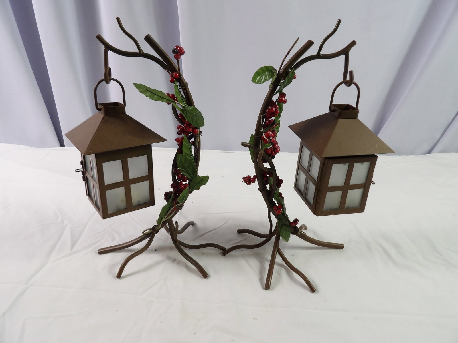 Pair of Tea Light Holders.: Pair of Tea Light Holders. All measurements approximate. Please see photos for condition and details. Selling as is from 04281.