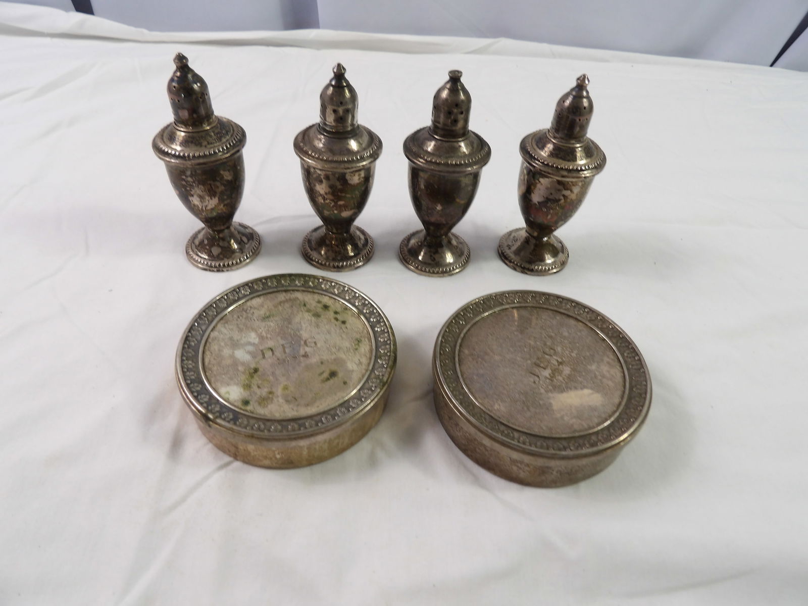 Salt and Pepper Shakers/Containers: 4 Sterling Weighted Salt and Pepper Shakers, and 2 Silver Plate Containers. All measurements approximate. Please see photos for condition and details. Selling as is from 04281.