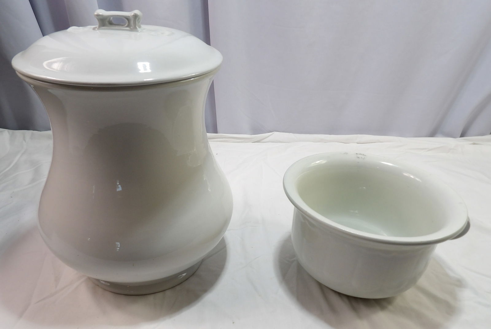 Pair of Porcelain Bowls: Pair of Porcelain Bowls, 1 Royal Ironstone, 1 Unnamed. All measurements approximate. Please see photos for condition and details. Selling as is from 04281.