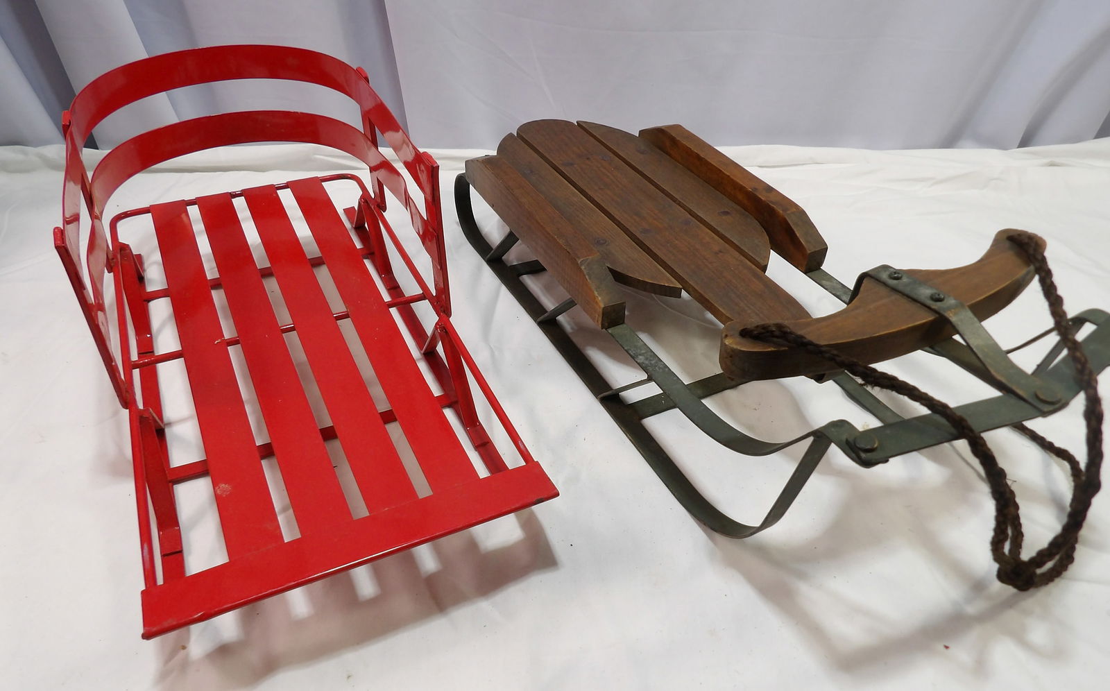 Pair of Decorative Sleds: Pair of 18" Decorative Sleds. All measurements approximate. Please see photos for condition and details. Selling as is from 04281.
