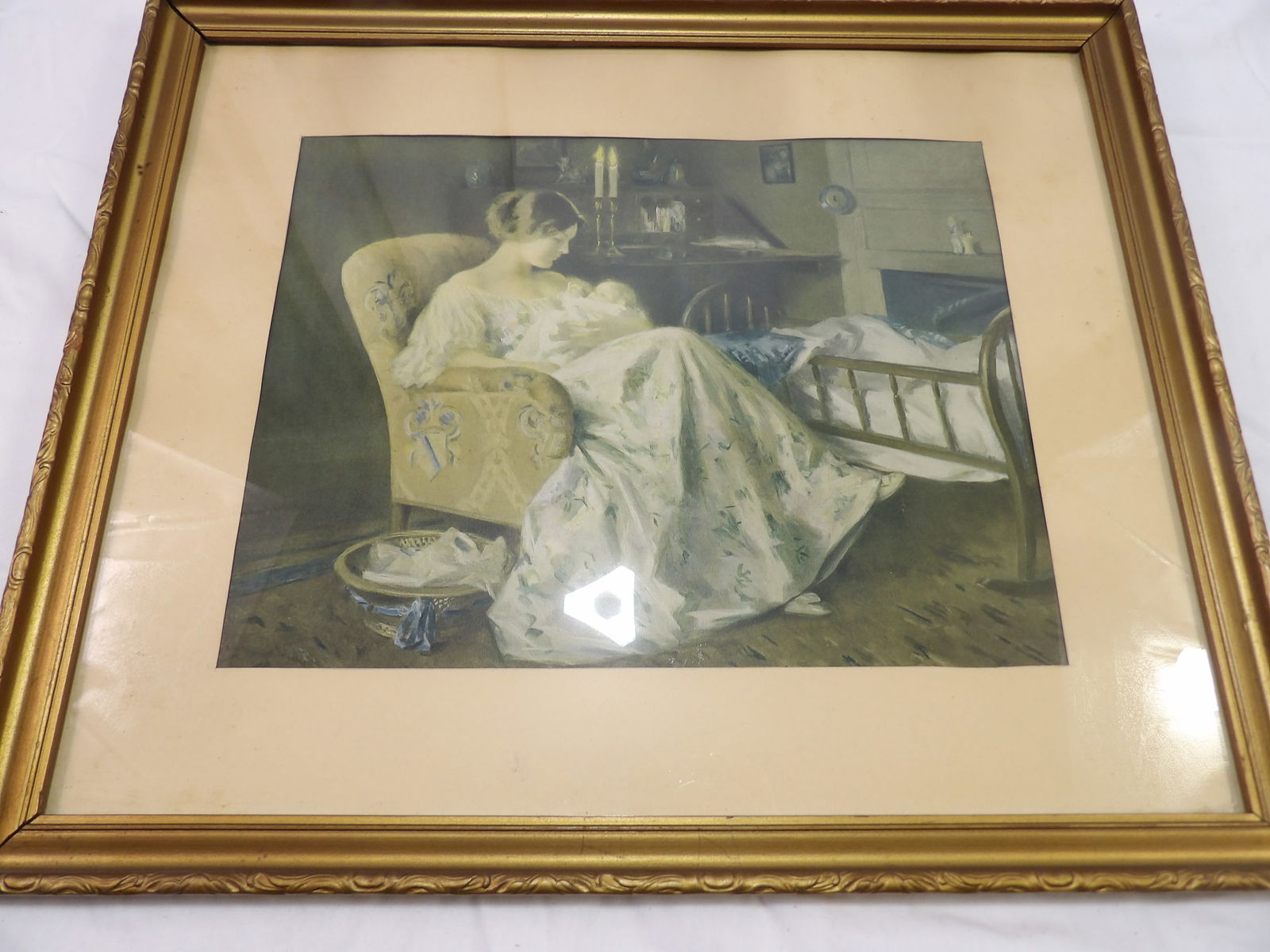 Framed Print of Woman and Child: Framed Print of Woman and Child, 16" X 18". All measurements approximate. Please see photos for condition and details. Selling as is from 04281.