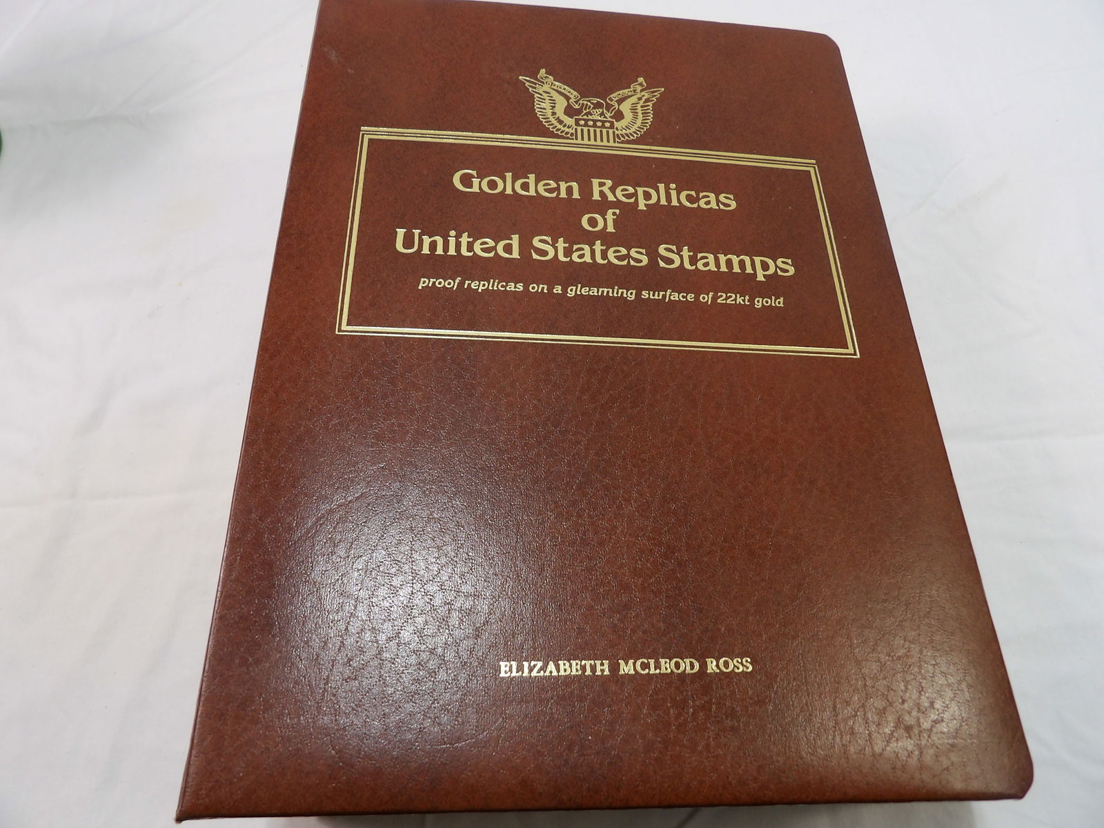 Postal Comm Society 22K Golden Replicas of U. S. Stamps: Postal Commemorative Society, 22K Golden Replicase of U.S. Stamps. All measurements approximate. Please see photos for condition and details. Selling as is from 04281.